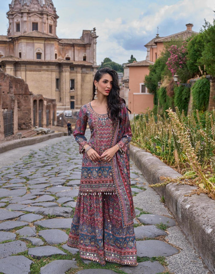 Deep teal multicolor jewel sharara set with a long patterned kurta and flared sharara