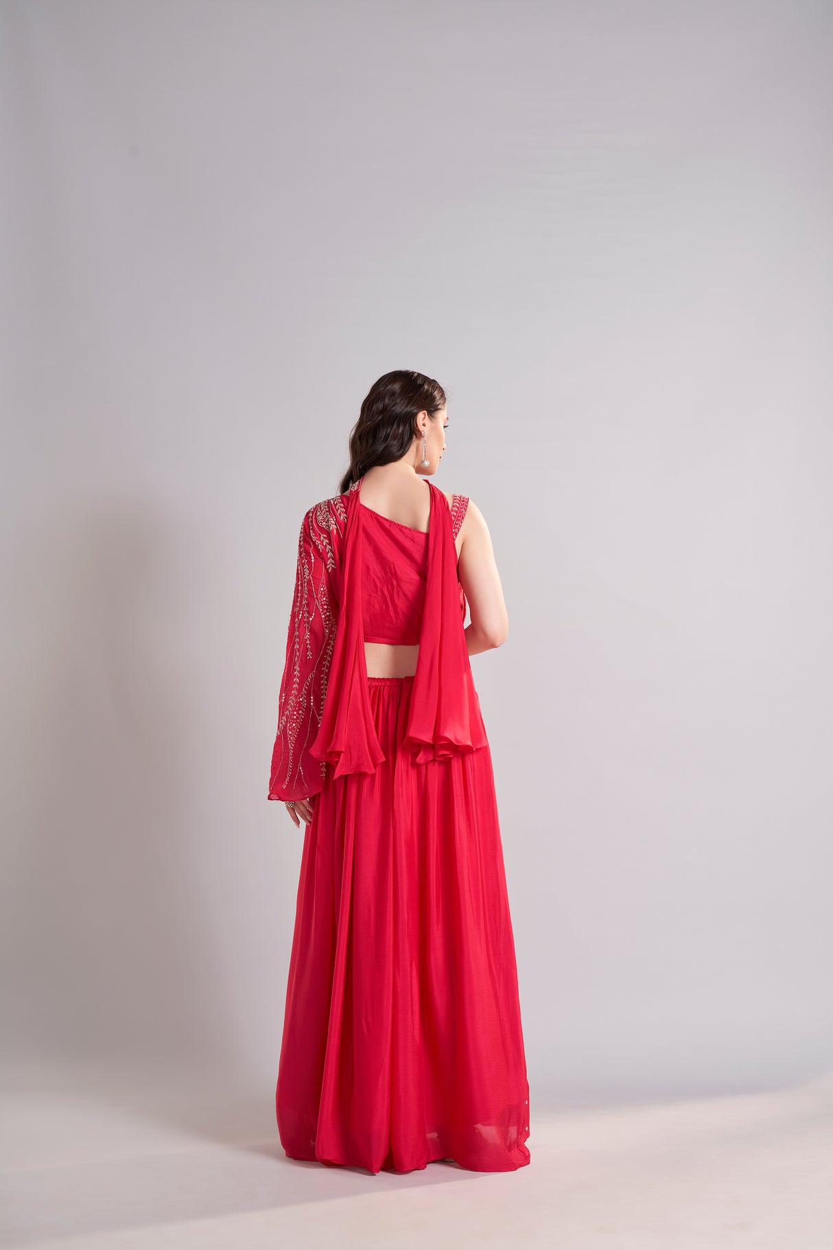 Crimson Red One-Shoulder Embellished Crop Top with Flowing Skirt – Glamorous Sangeet & Cocktail Outfit