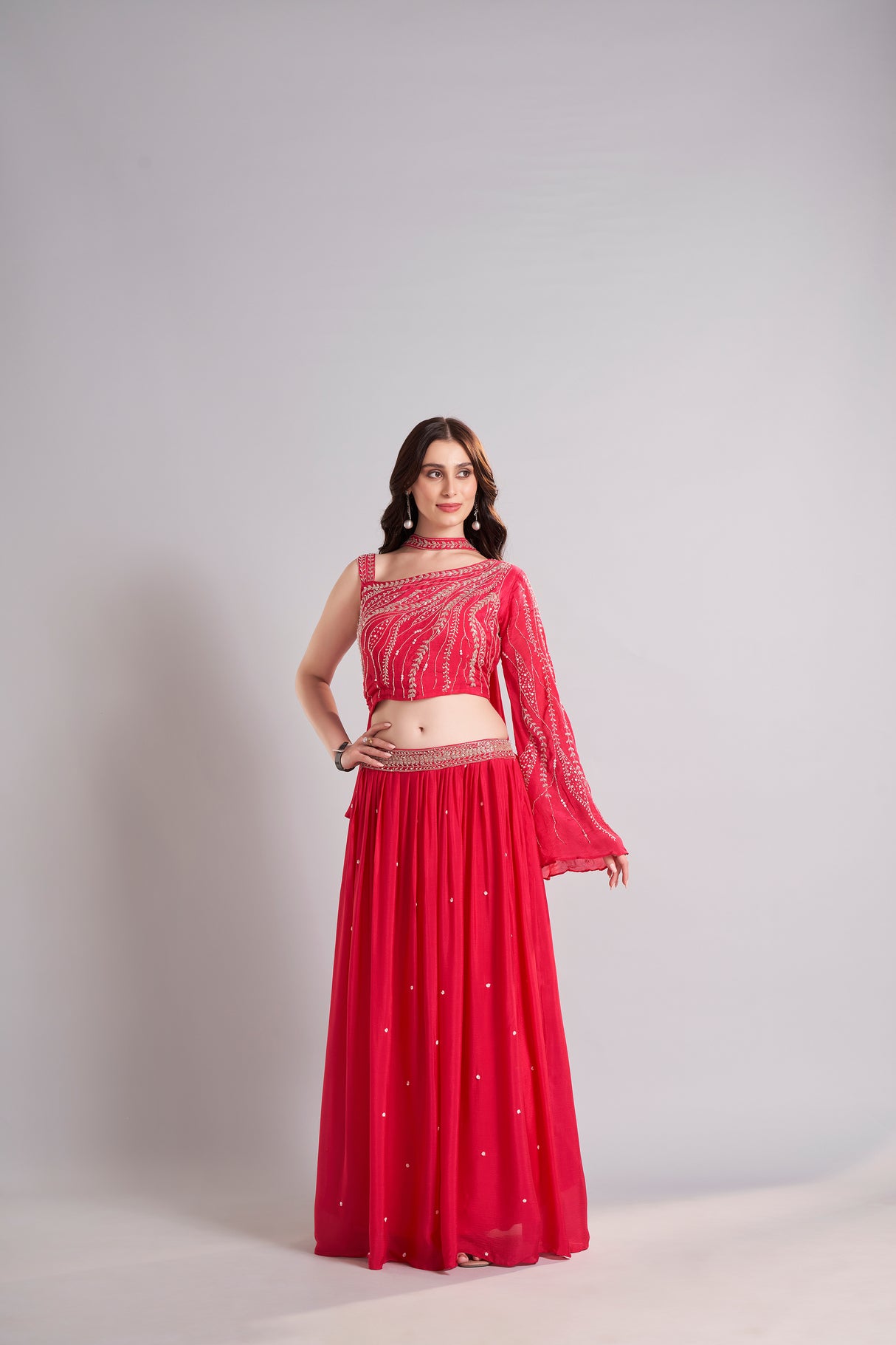 Crimson Red One-Shoulder Embellished Crop Top with Flowing Skirt – Glamorous Sangeet & Cocktail Outfit
