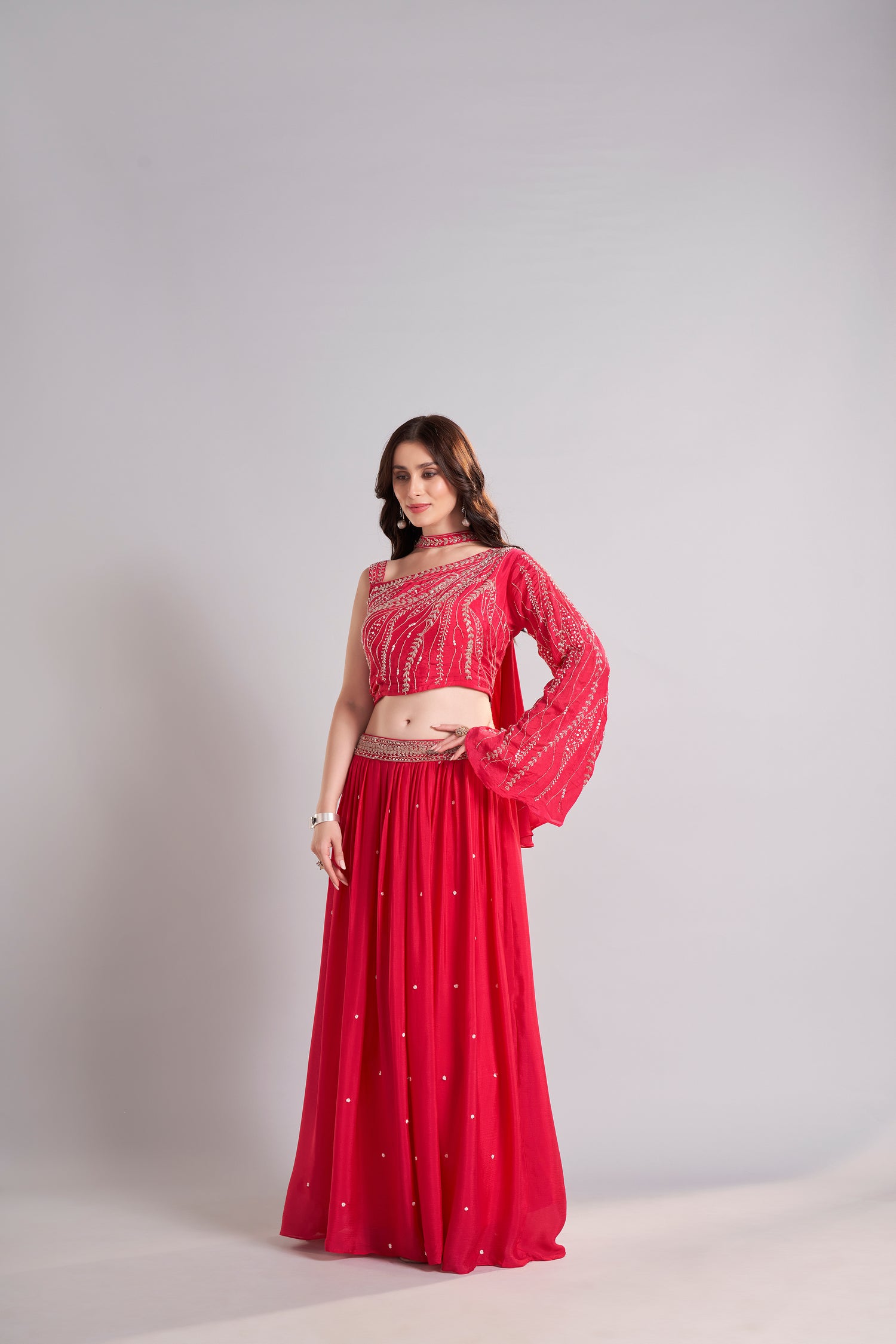 Crimson Red One-Shoulder Embellished Crop Top with Flowing Skirt – Glamorous Sangeet & Cocktail Outfit
