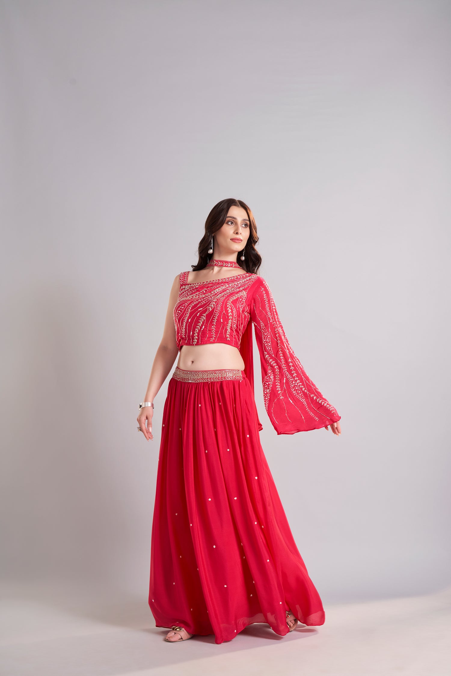 Crimson Red One-Shoulder Embellished Crop Top with Flowing Skirt – Glamorous Sangeet & Cocktail Outfit