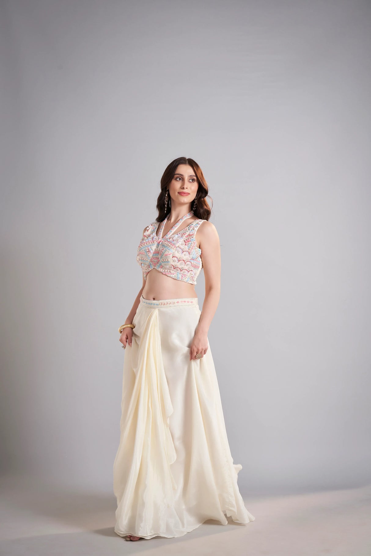 Ivory Draped Skirt with Pastel Embellished Crop Top & Flowing Drapes – Modern Wedding Reception Outfit - MishUUU
