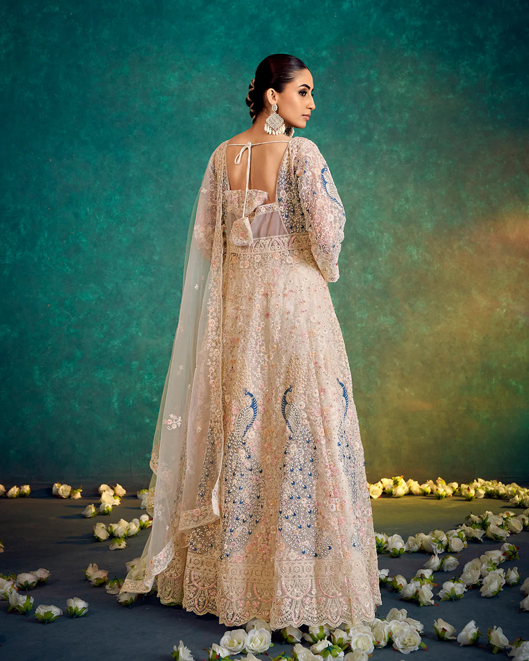 Ivory & Gold Handcrafted Lehenga with Peacock Detailing – Bridal & Festive Wear