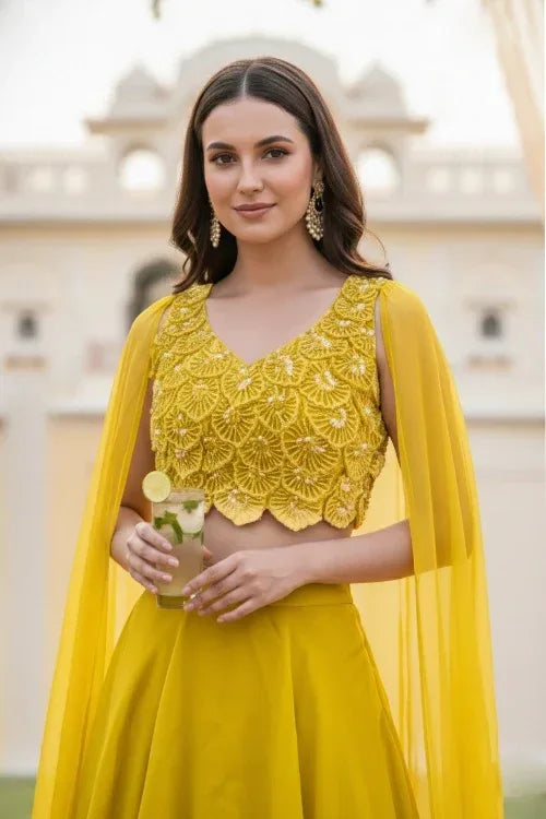 Sunshine Yellow Layered Lehenga with 3D Floral Blouse and Draped Cape – Haldi & Summer Wedding Guest Outfit - MishUUU