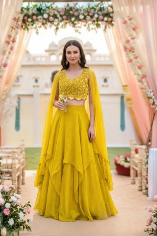 Sunshine Yellow Layered Lehenga with 3D Floral Blouse and Draped Cape – Haldi & Summer Wedding Guest Outfit