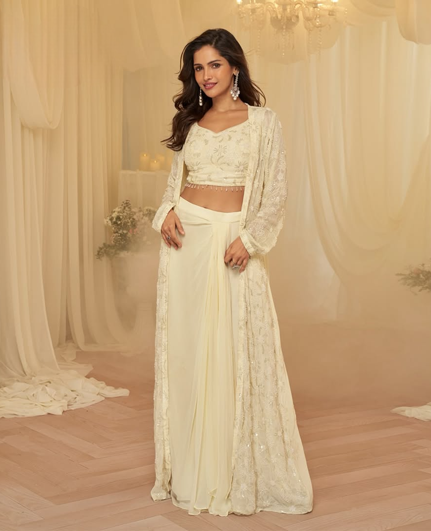 Ivory Glow Draped Lehenga with Embroidered Cape