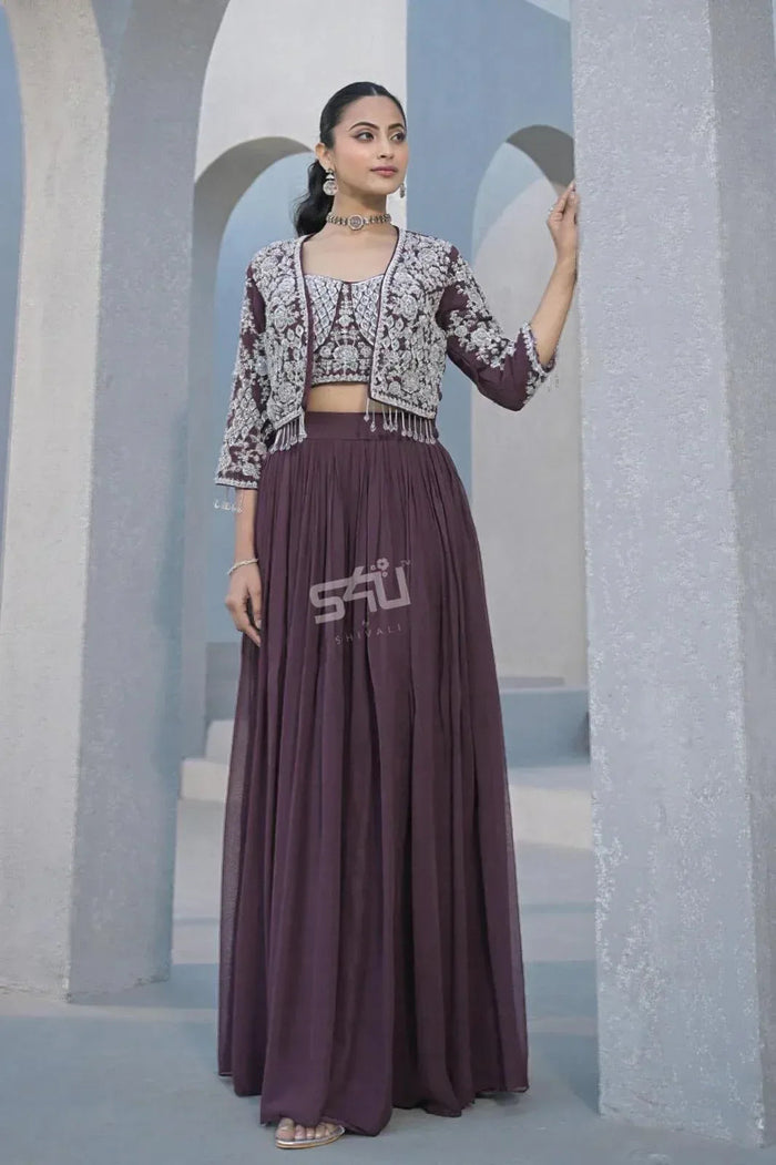 Wine lehenga with an embellished jacket, styled for a winter wedding function in Canada