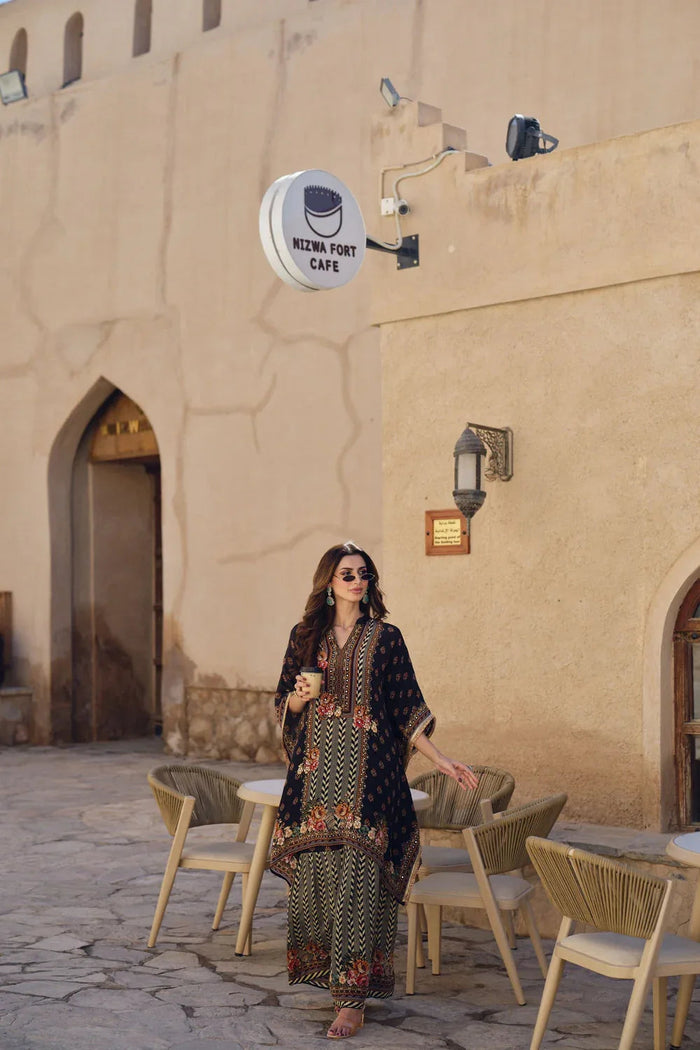 Printed kaftan co-ord set in light fabric, the kind of piece that recovers from a suitcase