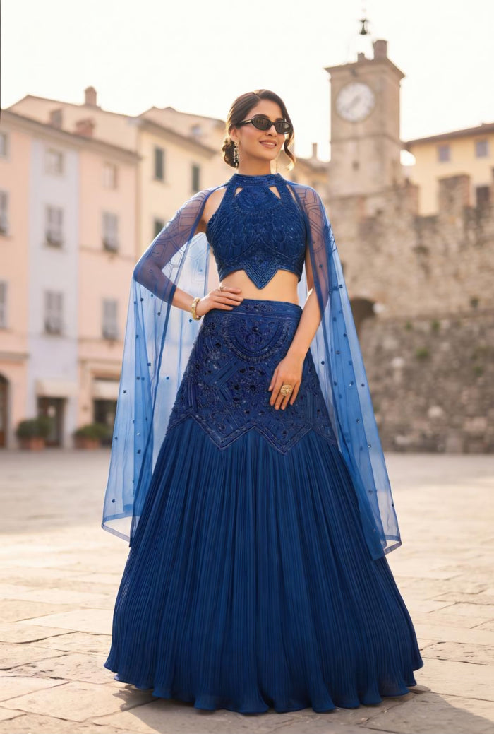 Royal blue celestial embroidered cape lehenga with a flared skirt and open cape drape