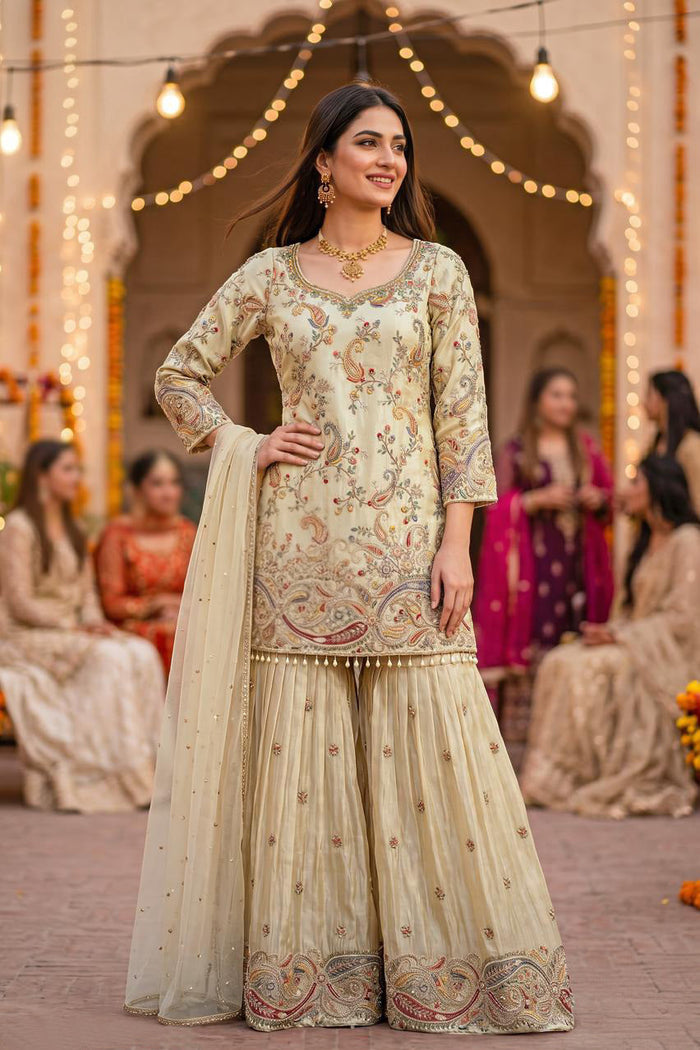 Ivory paisley embroidered gharara set with a matching dupatta