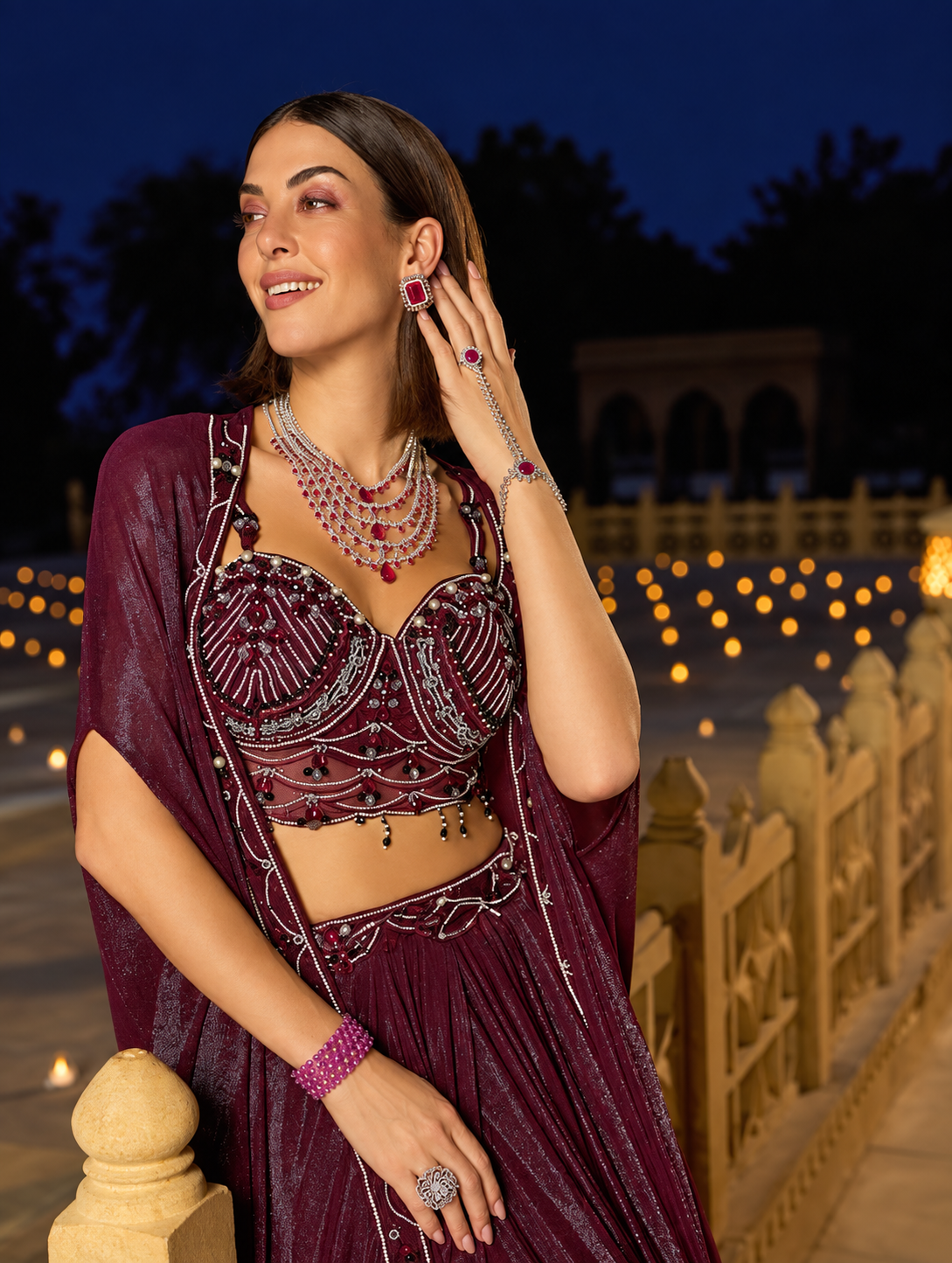 Deep wine palazzo set with a crystal embellished crop blouse, wide-leg pants and sheer cape