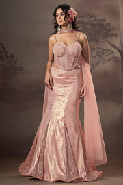 Blush toned mermaid couture set with a fitted flared silhouette