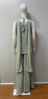 Side view showing the slit hem and wide-leg fall of a sage grey palazzo set
