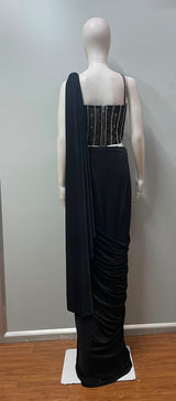 Black silver embellished pre-draped saree styled for an evening