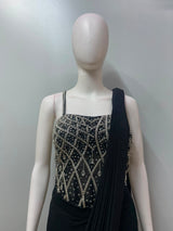 Detail of the pleated pallu on a black silver embellished saree