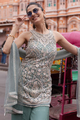 Side view of the seafoam mirrorwork kurta with wide-leg palazzo pants