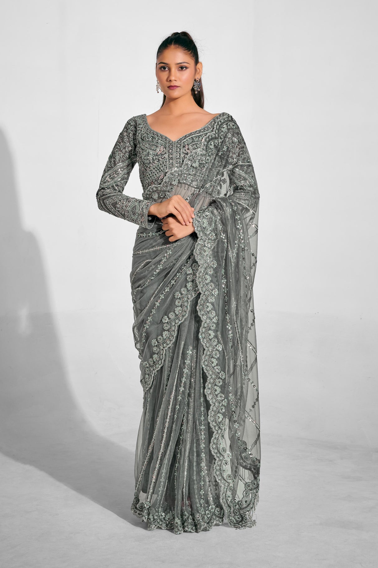 Opulent Silver Embroidered Net Saree with Luxe Sequin Detailing & Sculpted Blouse | Evening Saree for Receptions