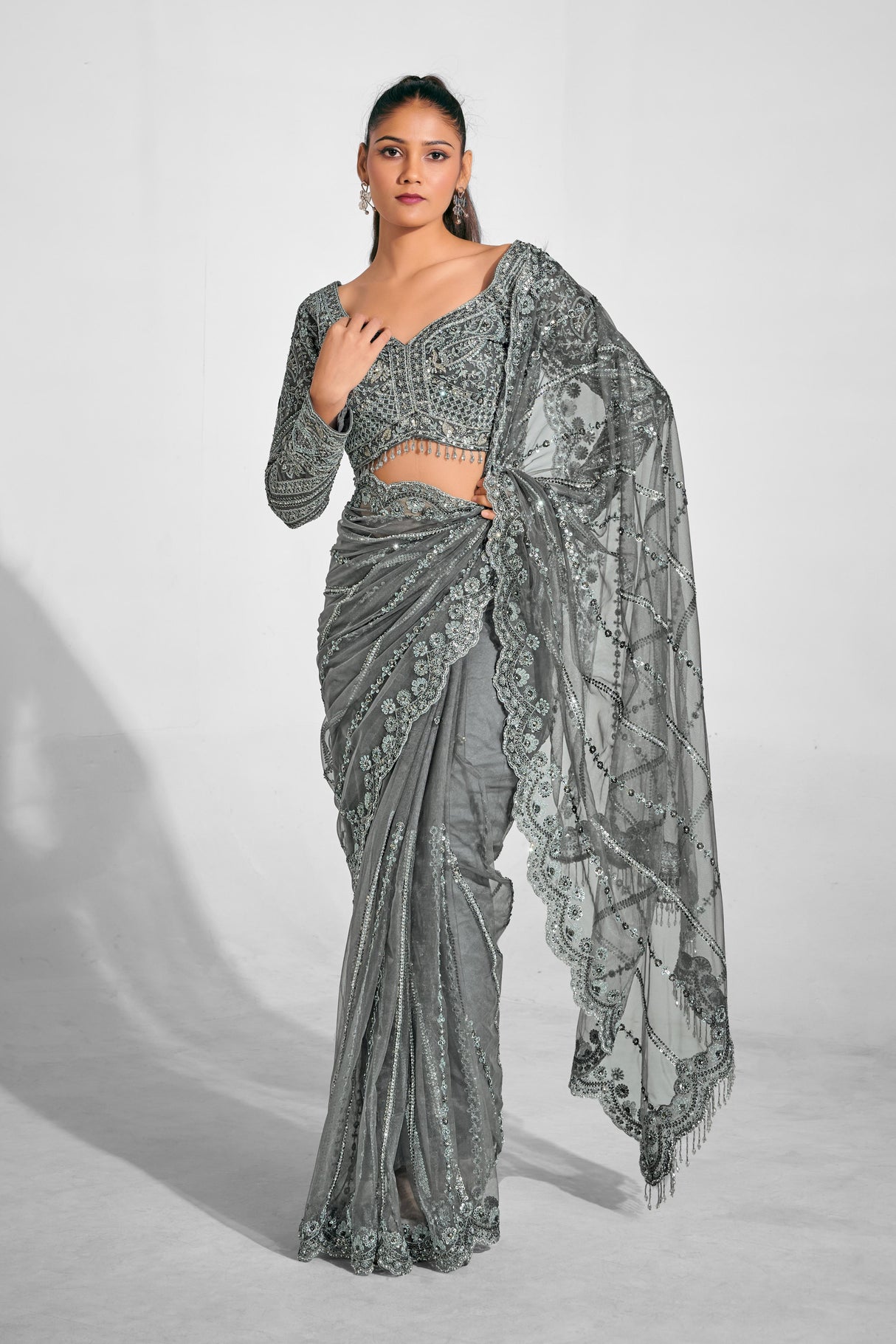 Opulent Silver Embroidered Net Saree with Luxe Sequin Detailing & Sculpted Blouse | Evening Saree for Receptions