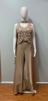 Full-length view of a peach champagne floral embroidered lehenga
