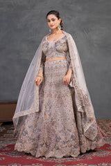 Champagne Blush Embroidered Lehenga – Regal Radiance with Handcrafted Detailing