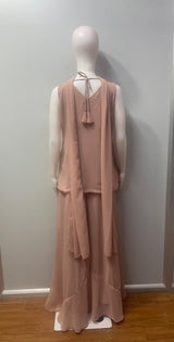 Side view showing the slit hem and wide-leg fall of a dusty rose palazzo set