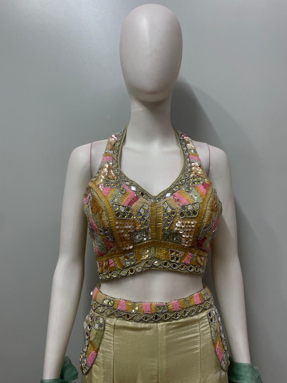 Back view of a seafoam mirror embroidered kurta and palazzo set