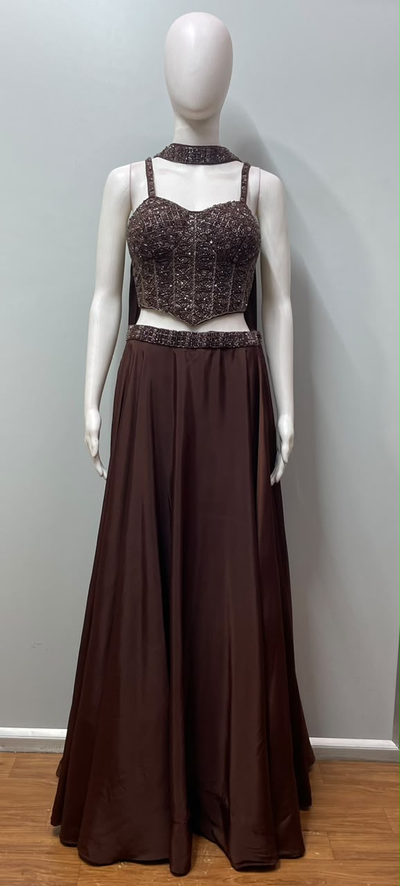 Close view of the embellishment on a chocolate bronze corset gown