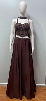 Close view of the embellishment on a chocolate bronze corset gown