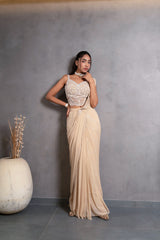 Detail of the pleated pallu on a champagne pearl draped saree