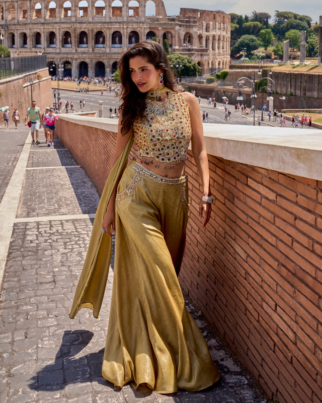 Antique gold palazzo set with mirror work and a matching kurta