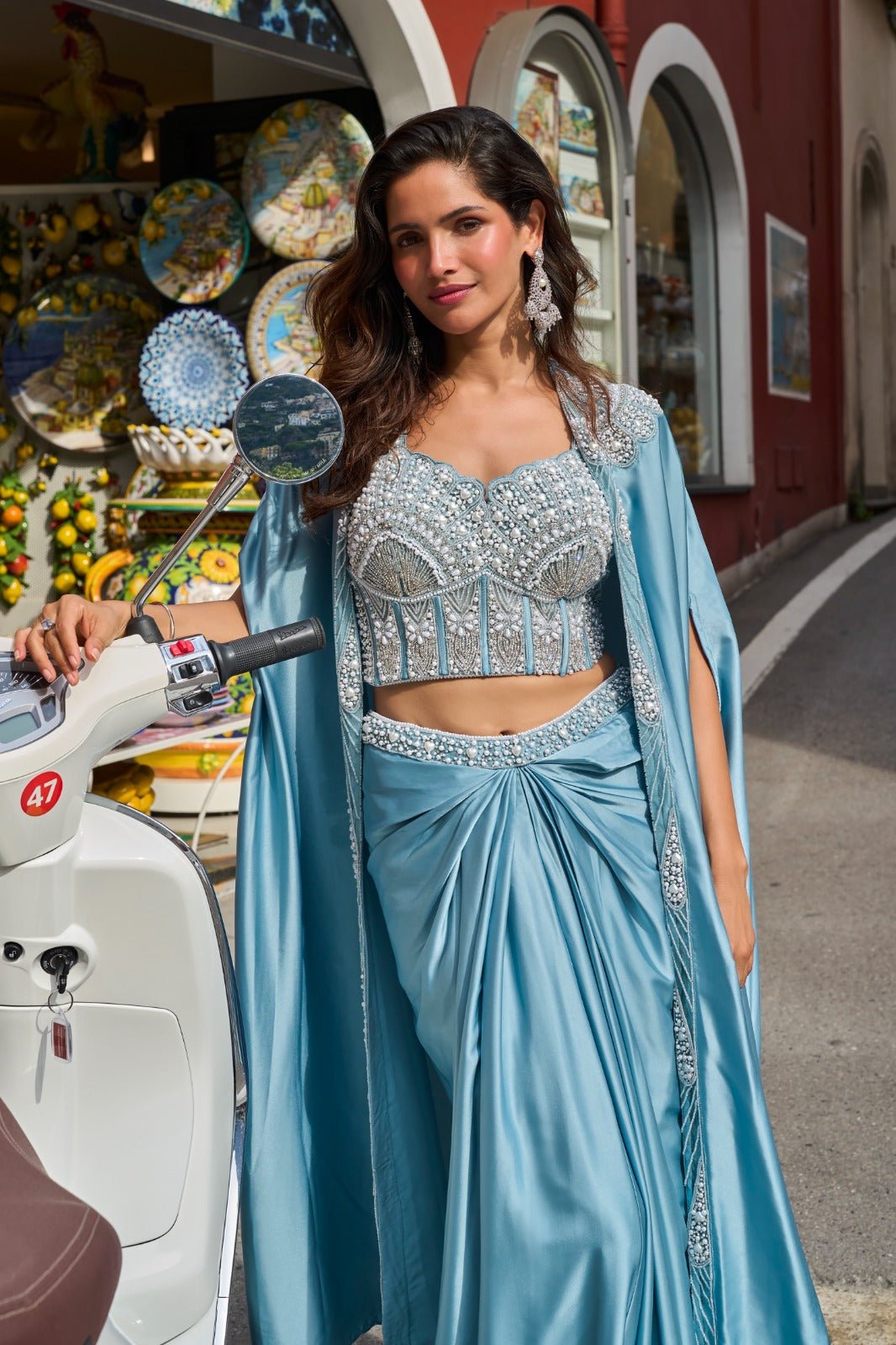 Detail of the cape drape and pallu on an ice blue pearl saree