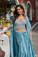Detail of the cape drape and pallu on an ice blue pearl saree