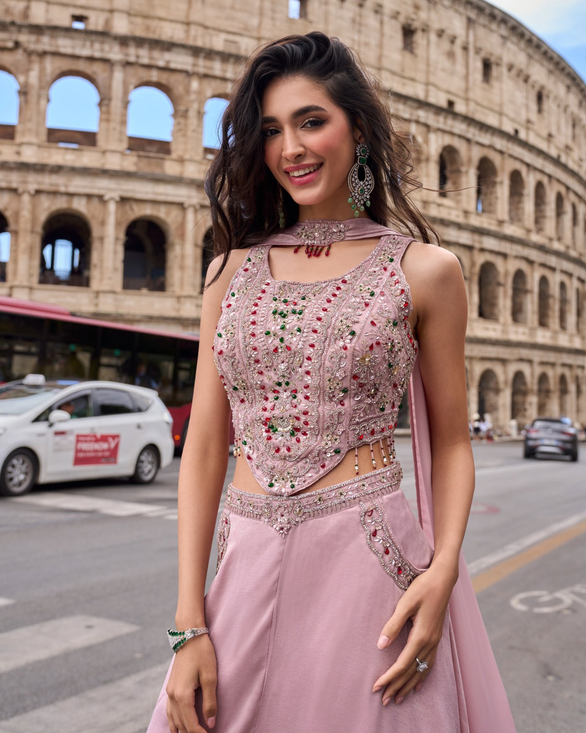 Close view of the mirror work on a dusty pink kurta and palazzo