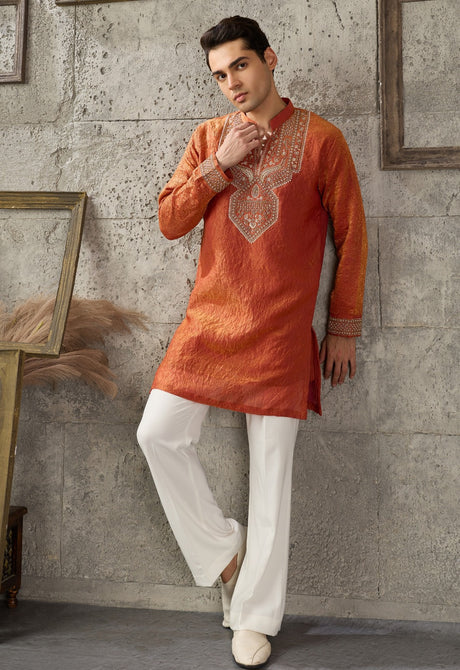 Burnt orange kurta set with silver embroidery and matching trousers