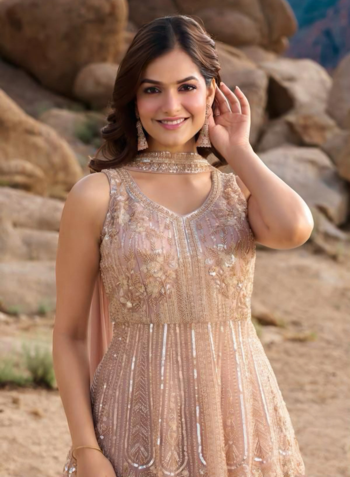 Gold embroidery detail on a champagne blush festive kurta