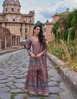 Deep teal multicolor jewel sharara set with a long patterned kurta and flared sharara