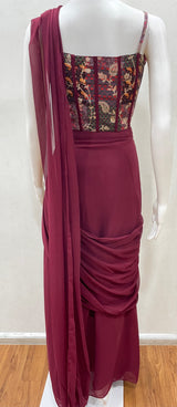 Detail of the pleated pallu on a wine embroidered draped saree