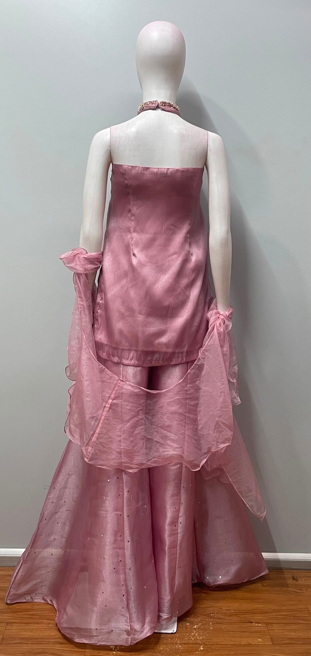 Blush mauve jewel palazzo ensemble styled for a festive evening