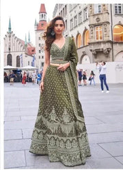 Olive green banarasi style lehenga with ethnic motif embroidery