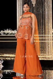 Tangerine peplum top with mirror embellishment and palazzo trousers