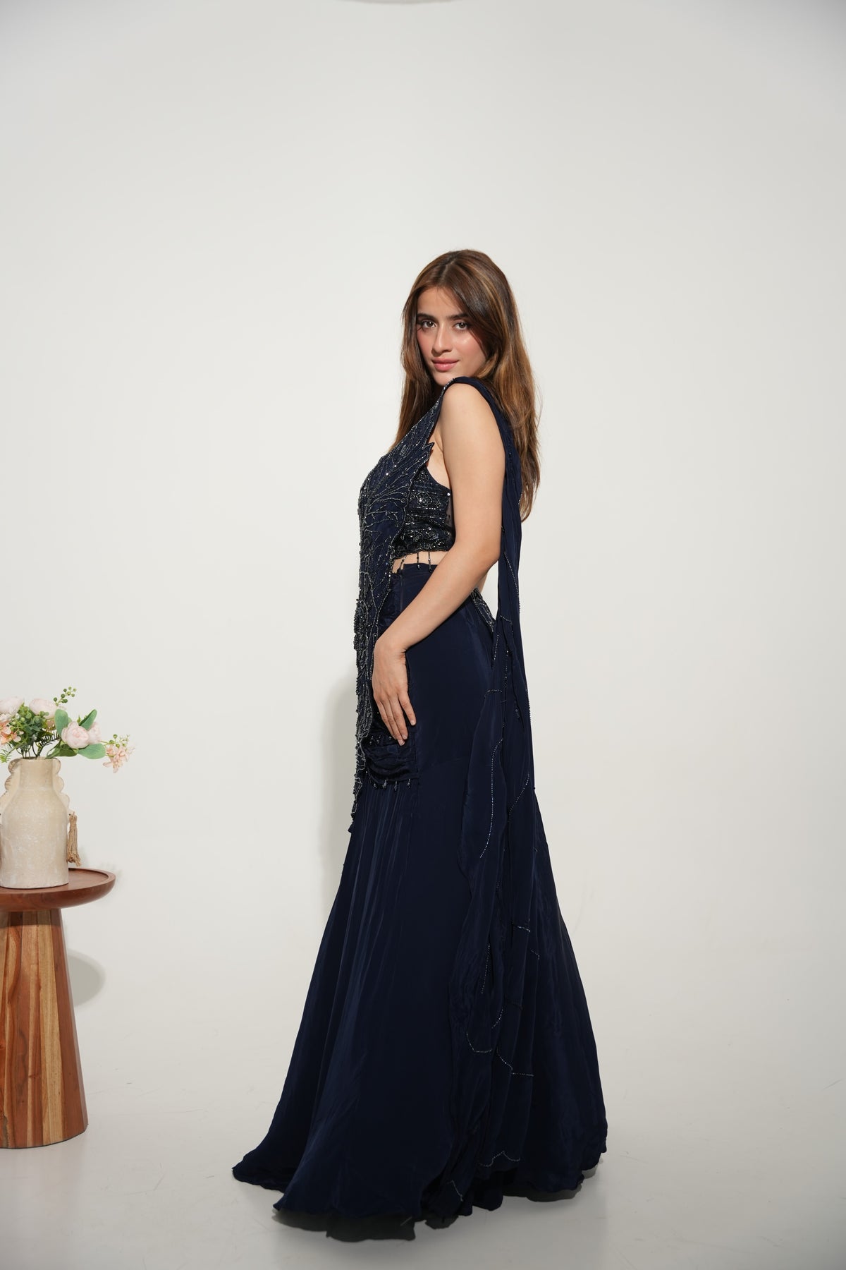 Detail of the blouse neckline on a midnight blue embellished lehenga