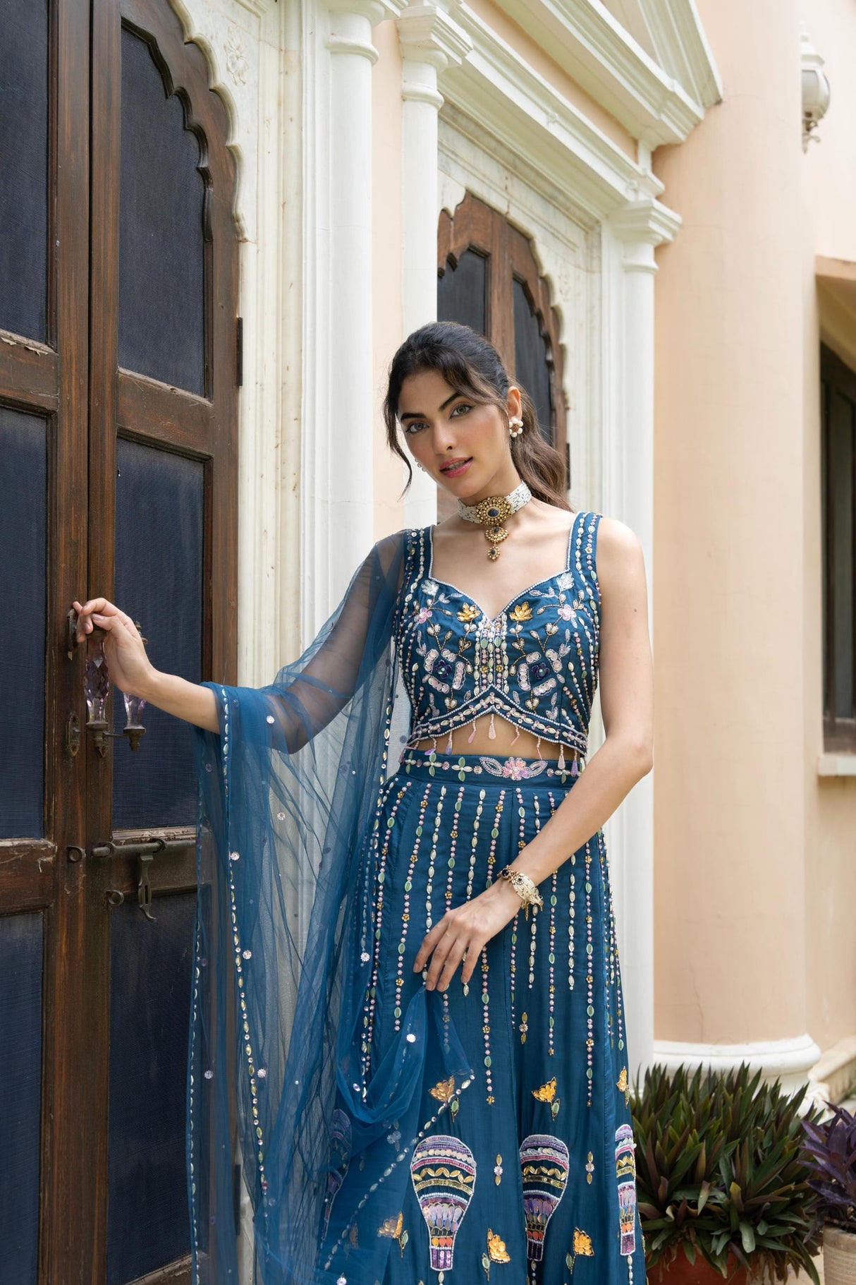 Peacock Teal Whimsical Embroidered Lehenga Ensemble