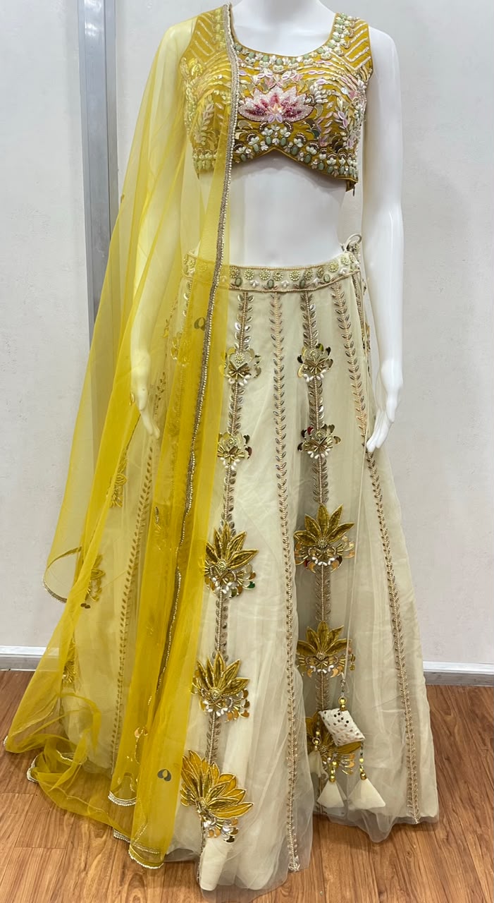 Mustard floral lehenga choli set styled for a haldi celebration