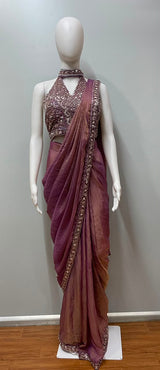 Close view of the embellishment on a mauve bronze draped saree