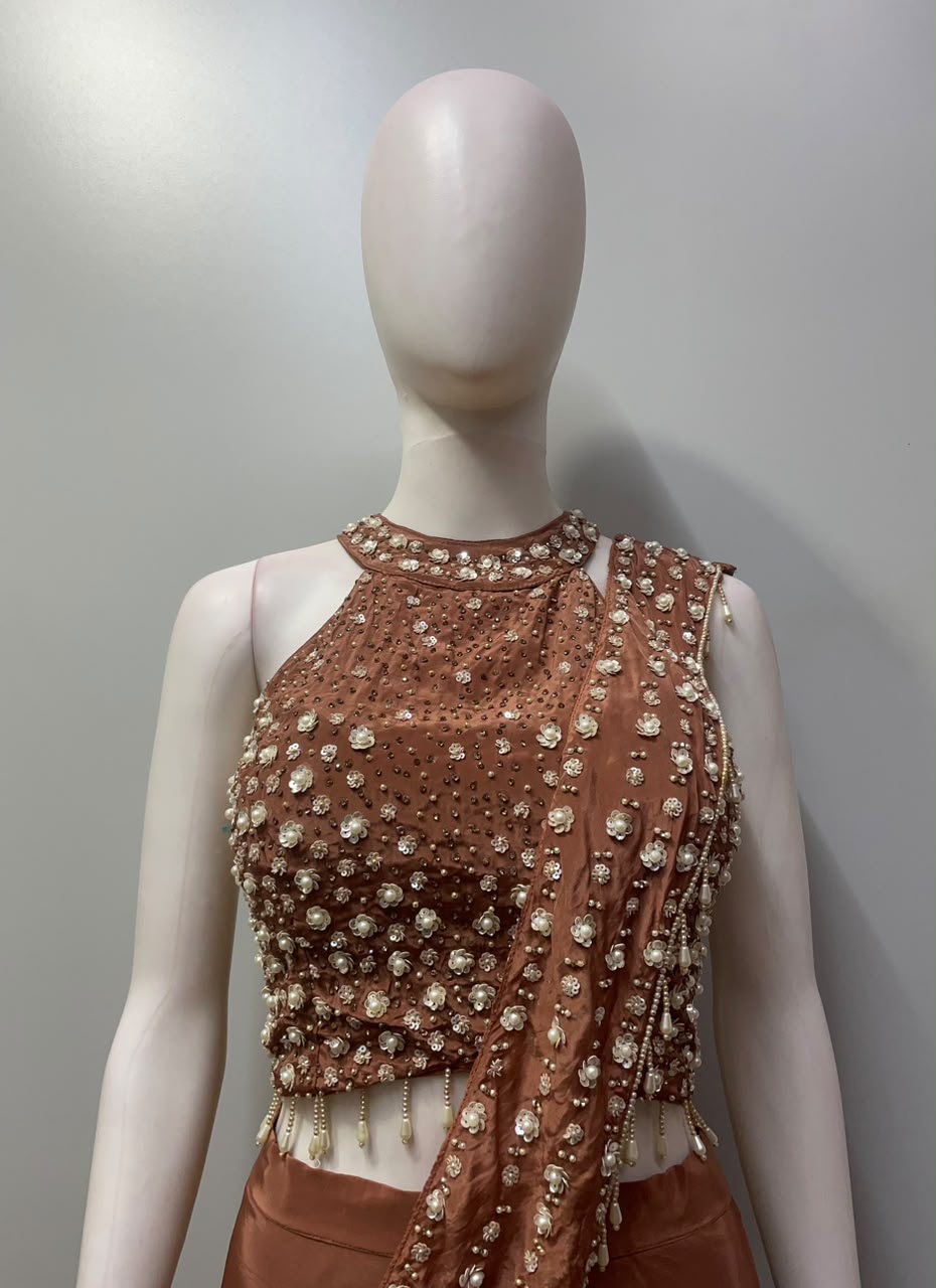 Full-length view of a copper pearl embellished drape set