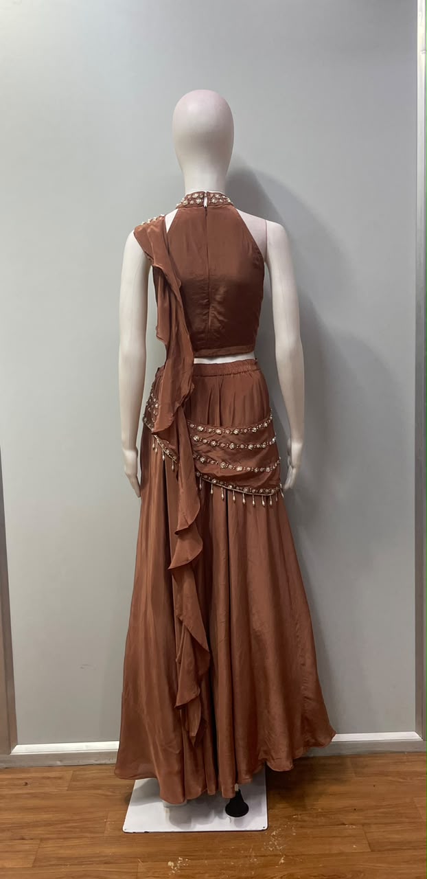 Copper pearl embellished drape set from a third angle on the model