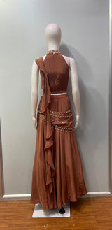 Copper pearl embellished drape set from a third angle on the model