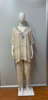 Hem and trouser detail on a chikankari mirror-embroidered co-ord set