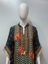 Close view of the nomad print fabric on a boho kaftan co-ord set