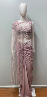 Close view of the sequin work on a lilac crop top and net cape